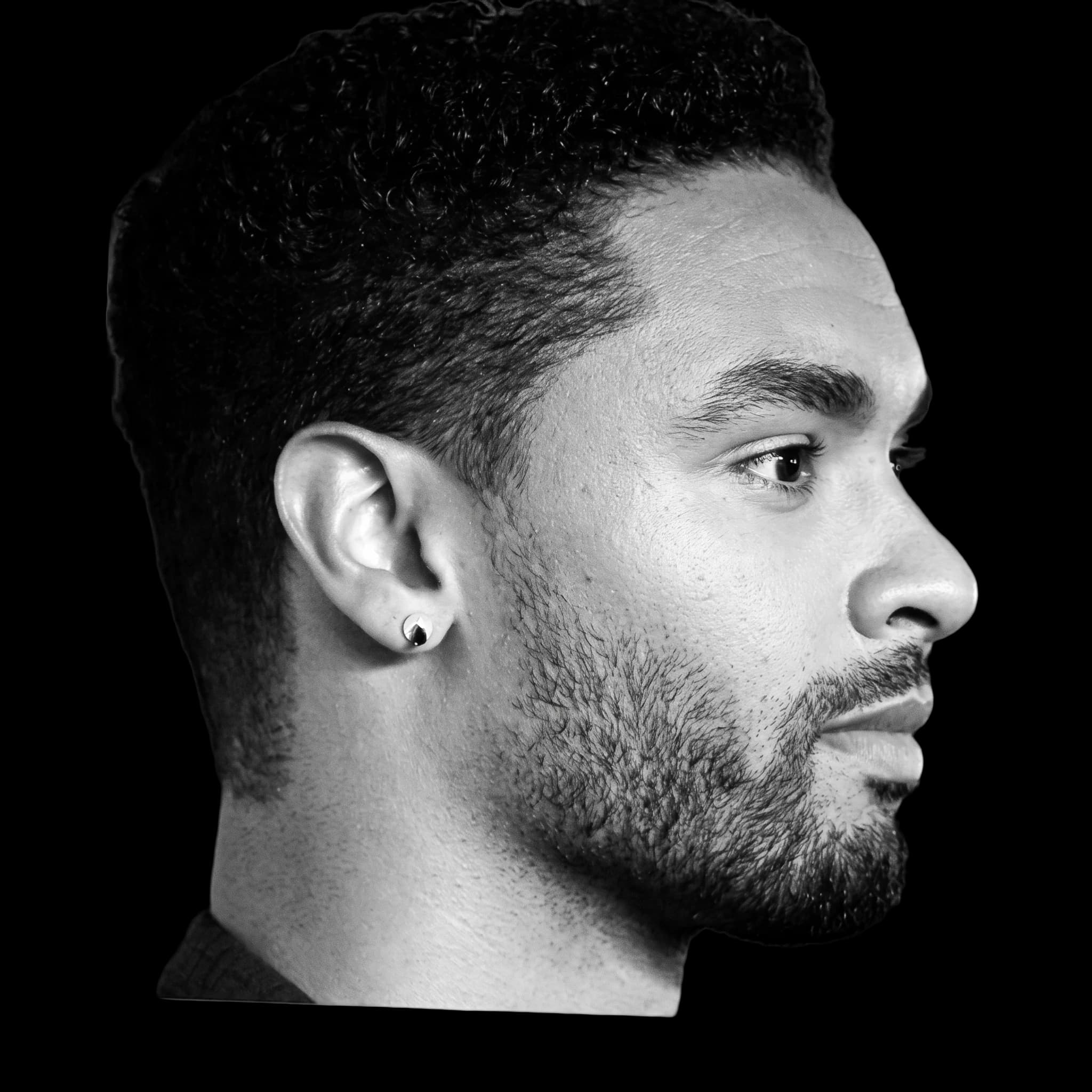 Rege Jean Page, side profile
